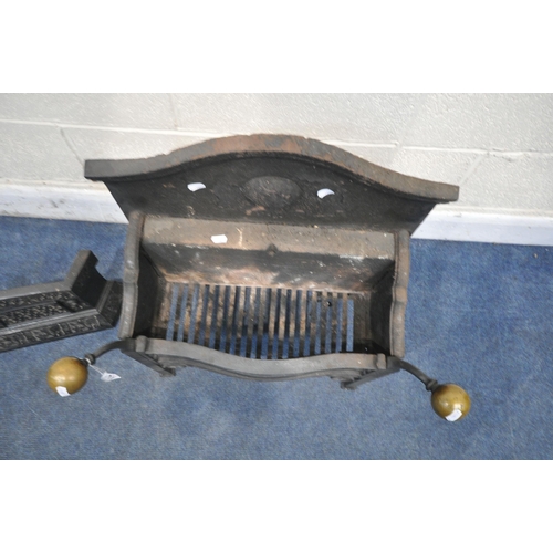 1242 - A CAST IRON FIRE GRATE, with brass finials, width 62cm x depth 34cm x height 67cm, along with a cast... 