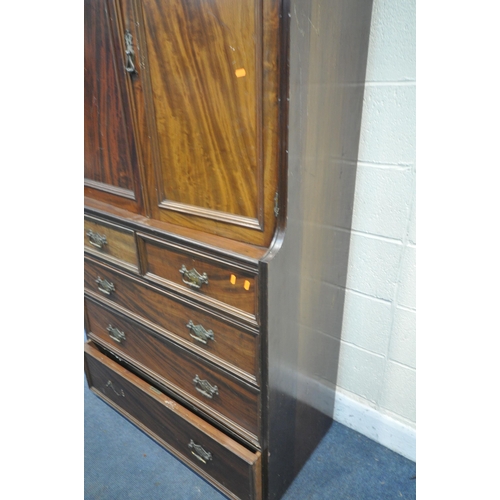 1269 - AN EDWARDIAN MAHOGANY COMPACTUM WARDROBE SECTION, enclosing four linen slides, over five drawers, wi... 