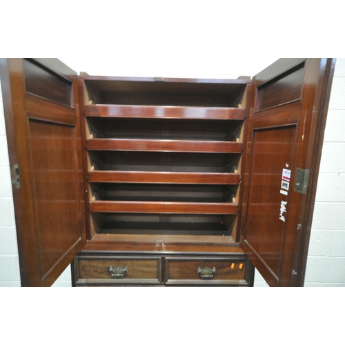 1269 - AN EDWARDIAN MAHOGANY COMPACTUM WARDROBE SECTION, enclosing four linen slides, over five drawers, wi... 