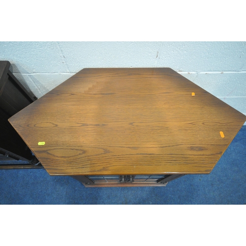 1324 - A 20TH CENTURY OAK SIDE TABLE, with three drawers and single cupboard door, width 65cm x depth 38cm ... 