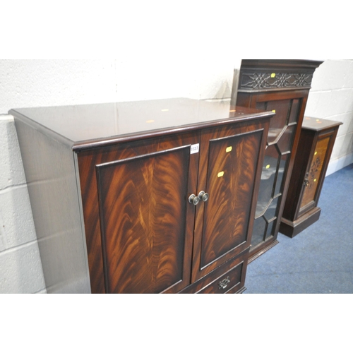 1327 - A FLAME MAHOGANY MEDIA CABINET, with two doors over a fall front door, width 71cm x depth 45cm x hei... 