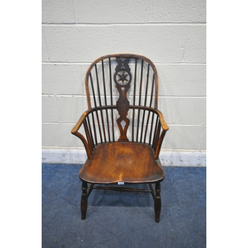 1328 - A 19TH CENTURY ELM WINDSOR CARVER CHAIR, with a spindle back and central star design (condition repo... 