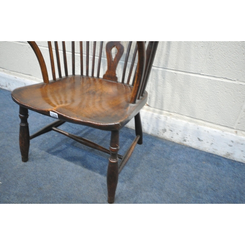 1328 - A 19TH CENTURY ELM WINDSOR CARVER CHAIR, with a spindle back and central star design (condition repo... 