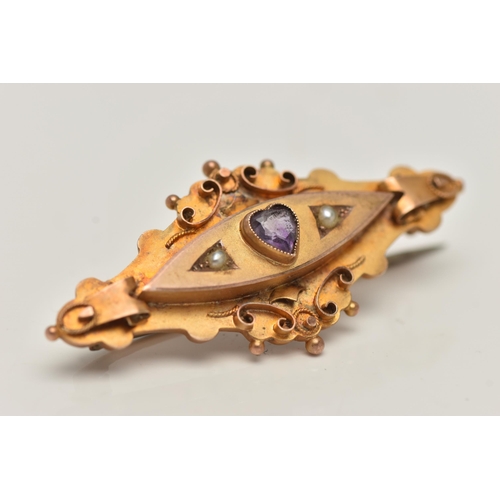 18 - AN EARLY 20TH CENTURY 9CT GOLD GEM SET BROOCH, set with a central heart cut amethyst, flanked with s... 