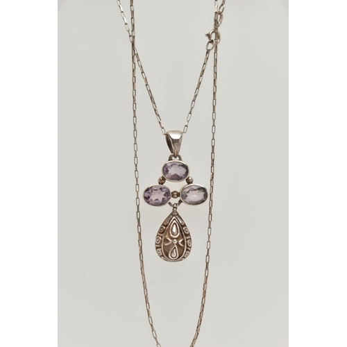 28 - A WHITE METAL GEM SET PENDANT NECKLACE, the pendant set with three oval cut amethysts, with a textur... 