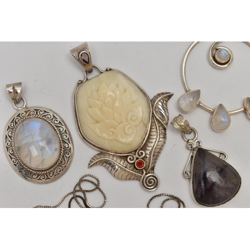 32 - FOUR GEM SET STATEMENT PENDANTS AND A CHAIN, to include a moonstone circular pendant, fitted with a ... 