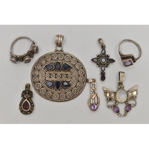 33 - A SMALL BAG OF WHITE METAL JEWELLERY, to include five pendants set with stones to include amethyst, ... 