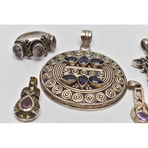 33 - A SMALL BAG OF WHITE METAL JEWELLERY, to include five pendants set with stones to include amethyst, ... 