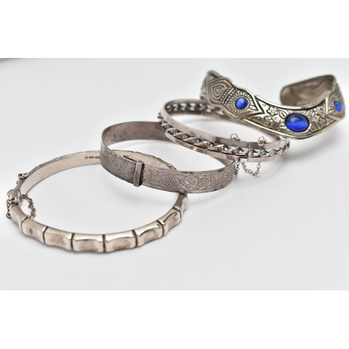 42 - FOUR BANGLES, to include a silver bamboo hinged bangle, hallmarked Birmingham, a silver floral chris... 