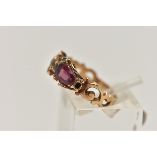 5 - A YELLOW METAL GEM SET VICTORIAN RING, set with two oval cut amethysts and circular cut emerald acce... 