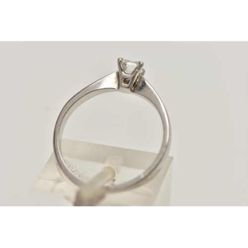 66 - A PLATINUM SINGLE STONE DIAMOND RING, emerald cut diamond prong set in platinum, leading on to a pin... 