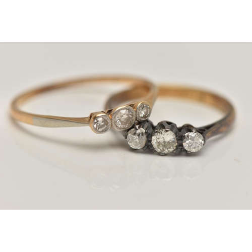 81 - TWO THREE STONE DIAMOND RINGS, the first an old cut diamond and two single stone diamonds, bezel set... 