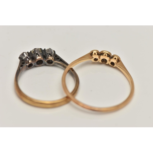 81 - TWO THREE STONE DIAMOND RINGS, the first an old cut diamond and two single stone diamonds, bezel set... 