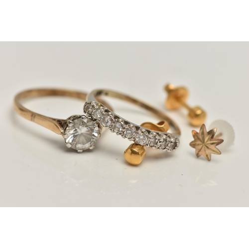 87 - TWO 9CT GOLD RINGS, the first set with nine circular cut cubic zirconia, prong set in white gold lea... 