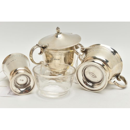 100 - A GEORGE VI SILVER THREE PIECE CRUET SET, of circular form with engraved band of three wavy lines, o... 