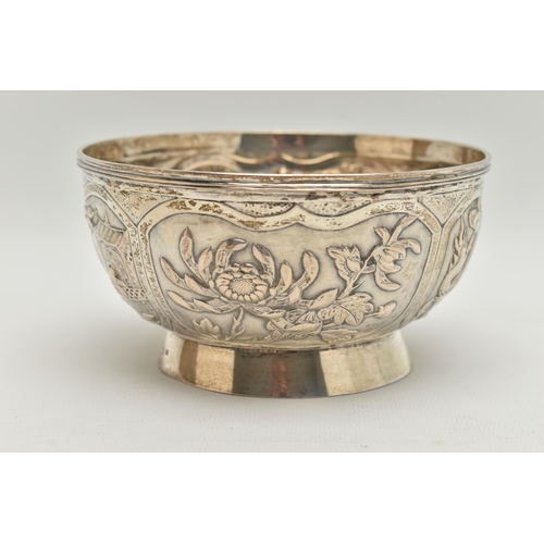 101 - A LATE 19TH / EARLY 20TH CENTURY CHINESE WHITE METAL BOWL OF CIRCULAR FORM, repoussé decorated with ... 