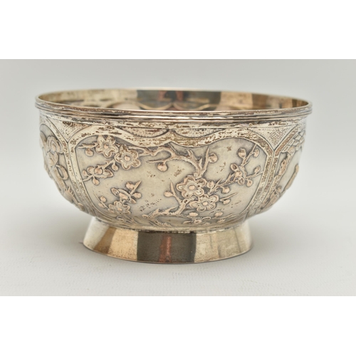 101 - A LATE 19TH / EARLY 20TH CENTURY CHINESE WHITE METAL BOWL OF CIRCULAR FORM, repoussé decorated with ... 