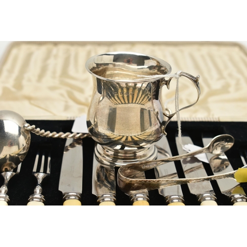 102 - TWO PIECES OF 20TH CENTURY SILVER, A WHITE METAL LADLE AND A CASED SET OF SIX IVORINE HANDLED STAINL... 