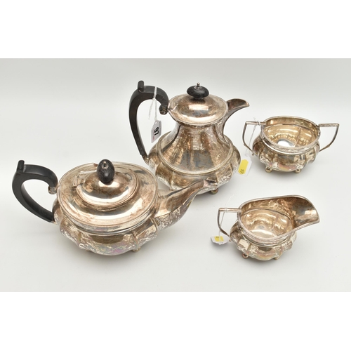 97 - A GEORGE V SILVER FOUR PIECE TEA SERVICE OF FLUTED OVAL FORM, comprising tea pot, hot water jug, mil... 