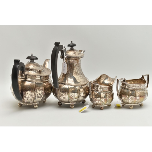 97 - A GEORGE V SILVER FOUR PIECE TEA SERVICE OF FLUTED OVAL FORM, comprising tea pot, hot water jug, mil... 