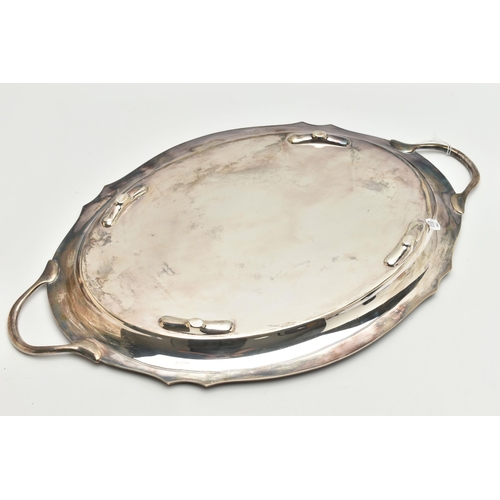 98 - A GEORGE VI SILVER OVAL TWIN HANDLED TRAY WITH WAVY EDGE, the front inscribed with presentation insc... 