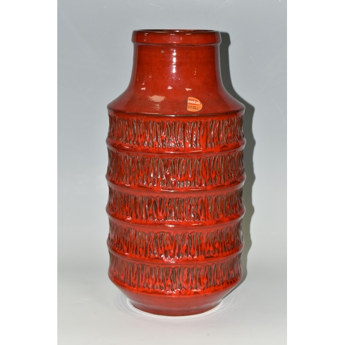 331 - A JASBA POTTERY VASE OF RIBBED CYLINDRICAL FORM, red glazed with textured vertical lines between the... 