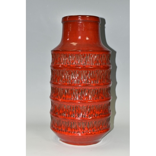 331 - A JASBA POTTERY VASE OF RIBBED CYLINDRICAL FORM, red glazed with textured vertical lines between the... 