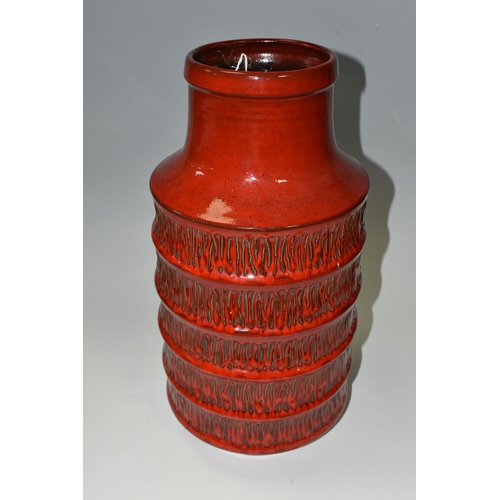 331 - A JASBA POTTERY VASE OF RIBBED CYLINDRICAL FORM, red glazed with textured vertical lines between the... 