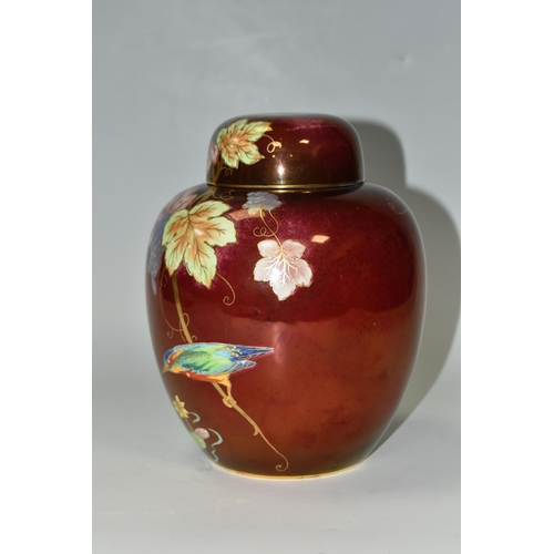 334 - A CARLTON WARE GINGER JAR AND COVER WITH THE KINGFISHER PATTERN ON A ROUGE GROUND, the base impresse... 