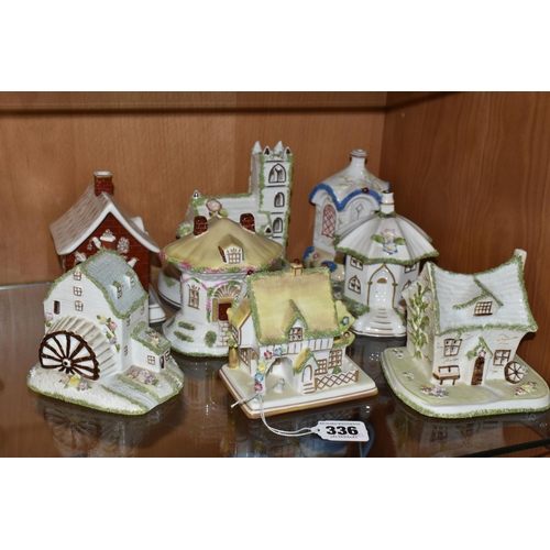 336 - EIGHT COALPORT BONE CHINA COTTAGES / BUILDINGS PASTILLE BURNERS, comprising 'Village Church', 'The T... 