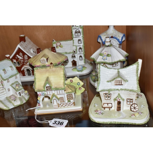 336 - EIGHT COALPORT BONE CHINA COTTAGES / BUILDINGS PASTILLE BURNERS, comprising 'Village Church', 'The T... 