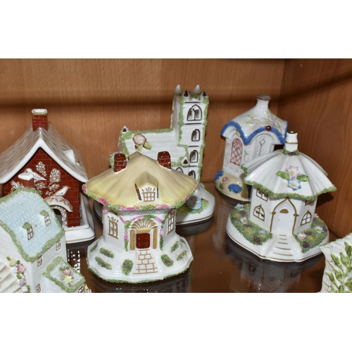 336 - EIGHT COALPORT BONE CHINA COTTAGES / BUILDINGS PASTILLE BURNERS, comprising 'Village Church', 'The T... 