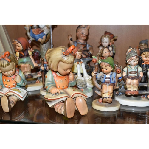 347 - A COLLECTION OF TWENTY TWO GOEBEL HUMMEL FIGURES, A HUMMEL LAMP WITH SHADE AND A HUMMEL REUGE MUSICA... 