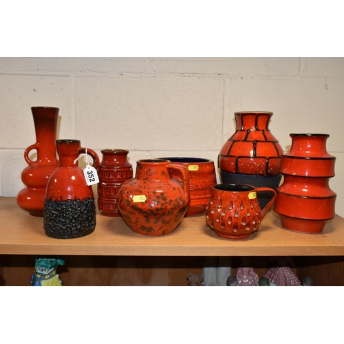 352 - EIGHT WEST GERMAN RED GLAZED POTTERY VASES, EWERS, ETC, including a twin handled vase, height 25cm, ... 