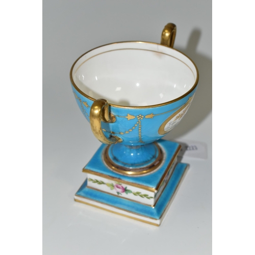 358 - AN EARLY 20TH CENTURY MINTONS TWIN HANDLED PEDESTAL BOWL, turquoise and gilt ground hand painted wit... 