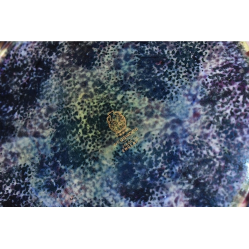 371 - DAISY MAKEIG-JONES FOR WEDGWOOD, A FAIRYLAND LUSTRE SHALLOW BOWL, the interior decorated in The Gard... 