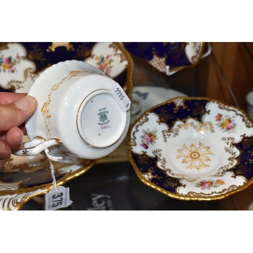 375 - TWO COALPORT DISHES, together with a cup and saucer, cobalt blue panels, Y2665 pattern inside cup, t... 