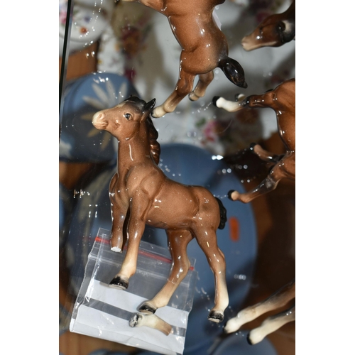 378 - TWO BESWICK HORSES AND SEVEN BESWICK FOALS, ALL BROWN GLOSS, comprising two Bois Roussel Racehorse, ... 