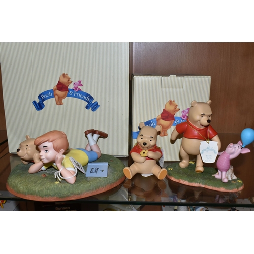 387 - THREE DISNEY 'POOH & FRIENDS' FIGURES, comprising a boxed 'A Petal For Your Thoughts'  figure 120328... 