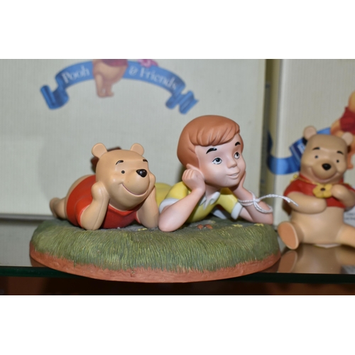 387 - THREE DISNEY 'POOH & FRIENDS' FIGURES, comprising a boxed 'A Petal For Your Thoughts'  figure 120328... 