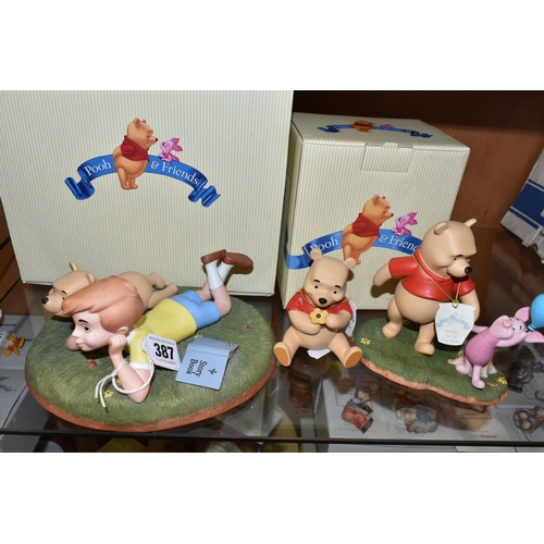 387 - THREE DISNEY 'POOH & FRIENDS' FIGURES, comprising a boxed 'A Petal For Your Thoughts'  figure 120328... 