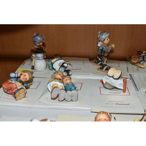 388 - A GROUP OF SEVEN BOXES OF STUDIO HUMMEL CHRISTMAS TREE DECORATIONS, twenty one figures comprising Le... 