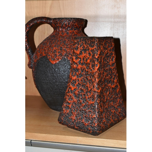 406 - A GERMAN RED LAVA GLAZE DESIGN FLAGON, impressed Germany 990-30 on the base, together with a graduat... 