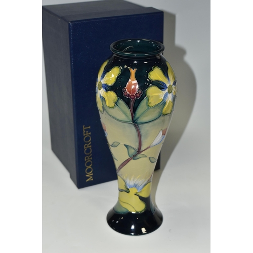 416 - A BOXED MOORCROFT POTTERY 'HYPERICUM' PATTERN VASE, of slender inverted baluster form and flared rim... 