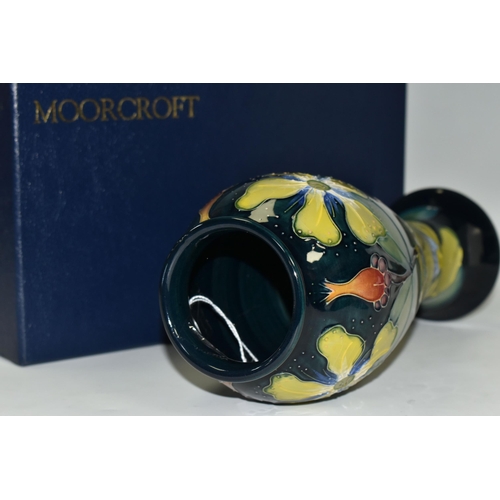 416 - A BOXED MOORCROFT POTTERY 'HYPERICUM' PATTERN VASE, of slender inverted baluster form and flared rim... 