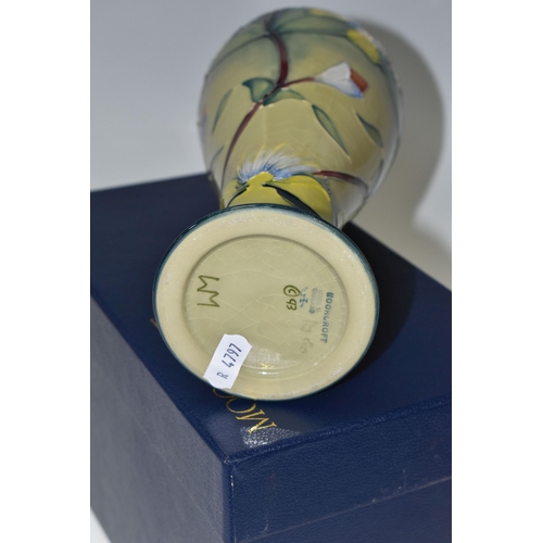 416 - A BOXED MOORCROFT POTTERY 'HYPERICUM' PATTERN VASE, of slender inverted baluster form and flared rim... 