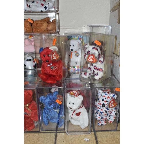 424 - A COLLECTION OF FORTY TWO TY BEANIE BABY ANIMALS, in perspex storage display cases, to include Curly... 