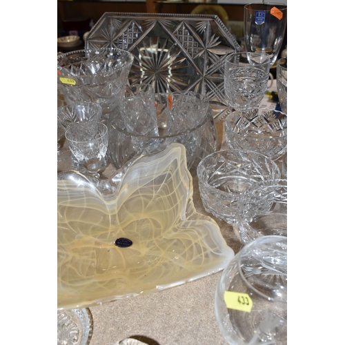 433 - A GROUP OF CUT CRYSTAL, comprising three Dartington Crystal wine glasses, an apricot coloured Murano... 