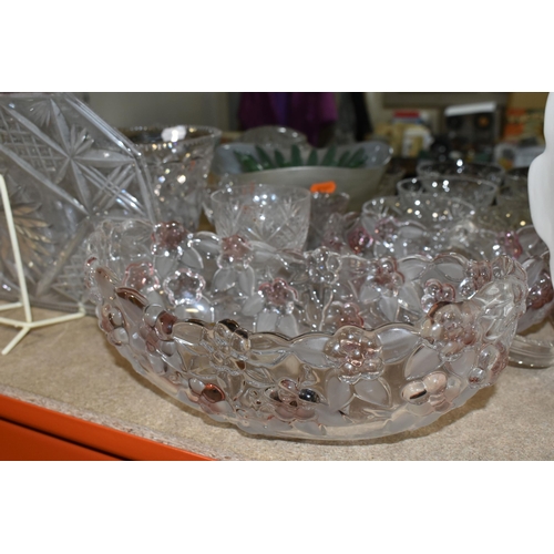 433 - A GROUP OF CUT CRYSTAL, comprising three Dartington Crystal wine glasses, an apricot coloured Murano... 