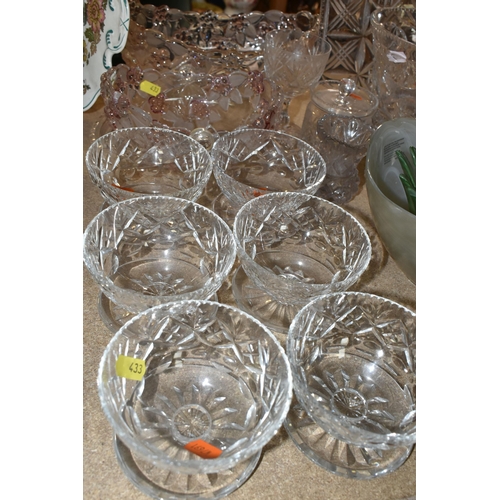 433 - A GROUP OF CUT CRYSTAL, comprising three Dartington Crystal wine glasses, an apricot coloured Murano... 